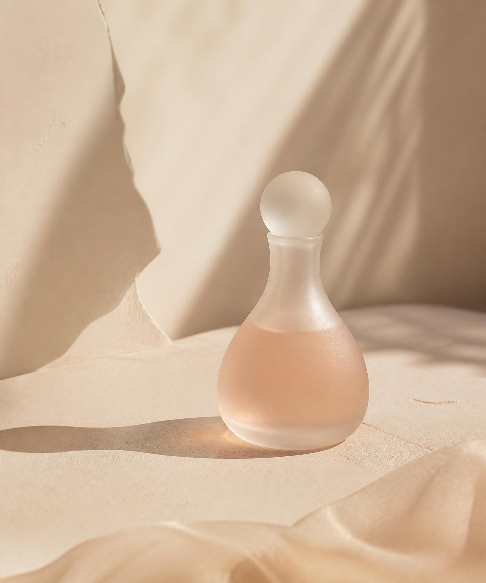 Sculptural frosted glass beauty vessel in warm daylight